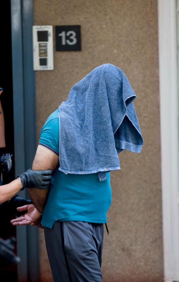 Los Mossos d'Esquadra se llevan detenido a un presunto yihadista en Barcelona, en julio de 2020.Albert Llop / NurPhoto via Getty Images
